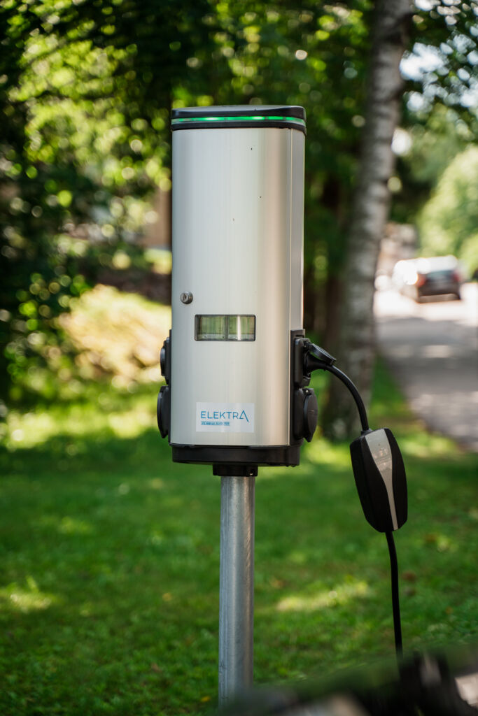 Elektra smart EV charging and engine-heating posts in a Nordic car park